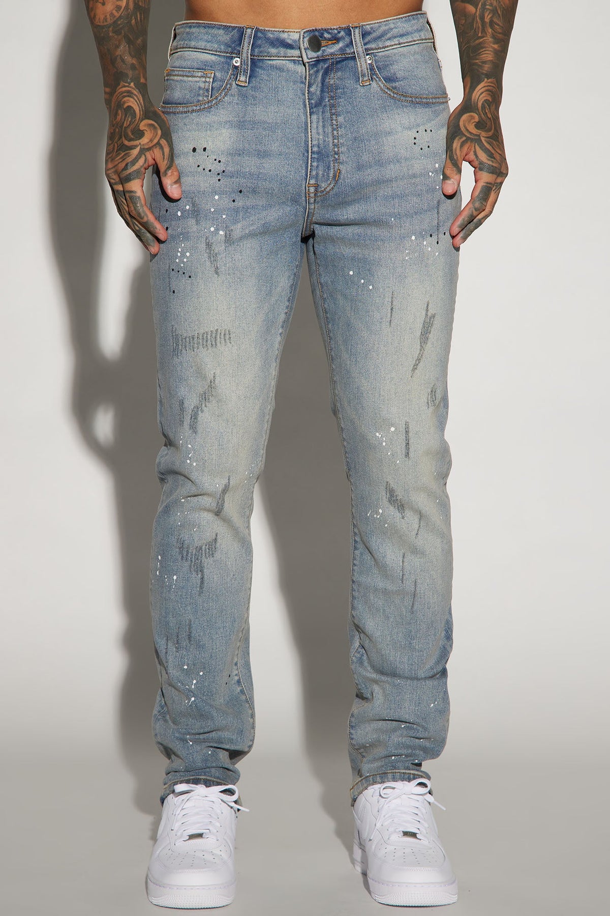Elan de Paris™ Ripped And Bleach Splatter Slim Jeans - Light Blue Wash