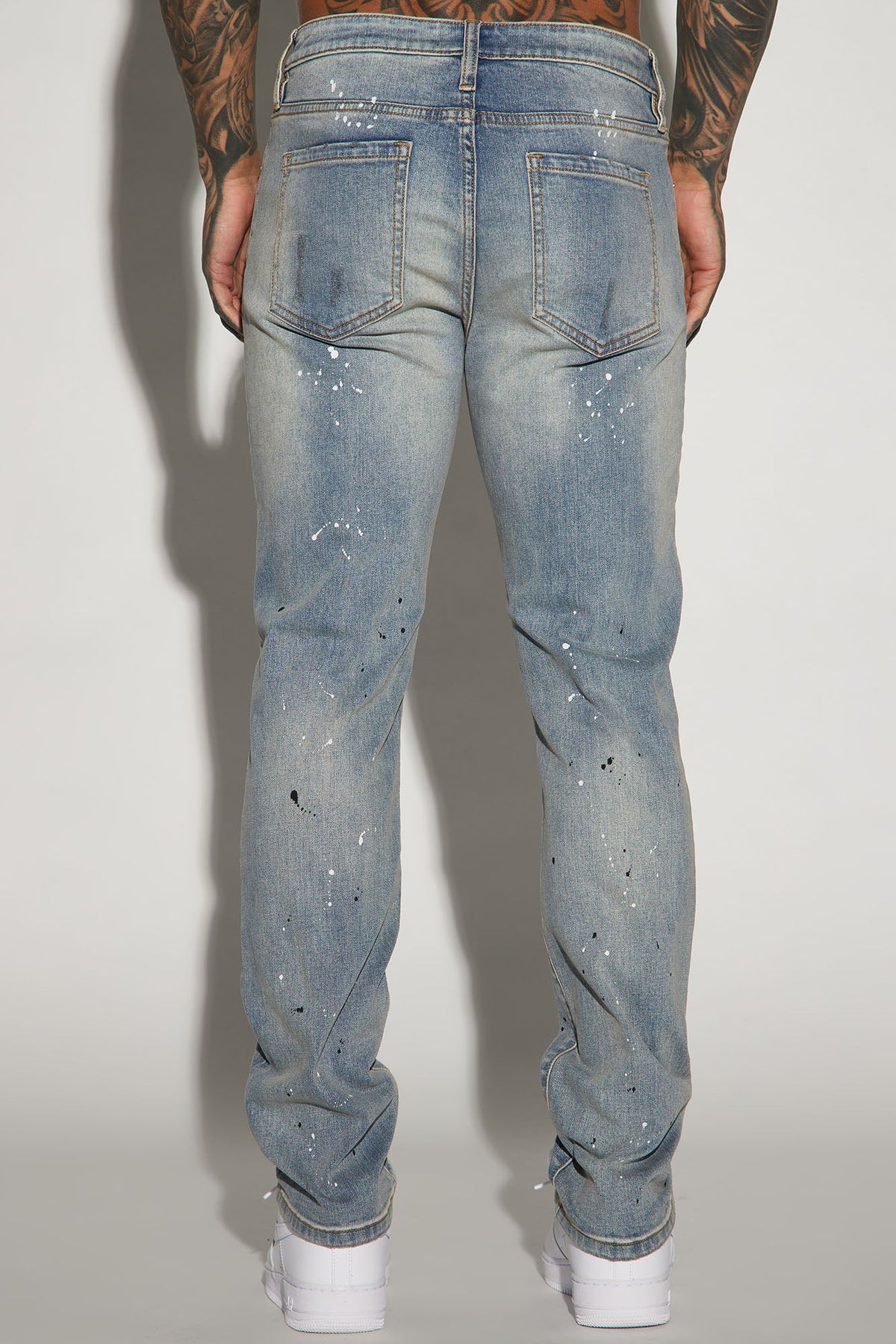 Elan de Paris™ Ripped And Bleach Splatter Slim Jeans - Light Blue Wash