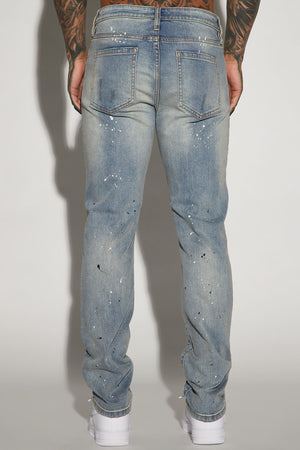Elan de Paris™ Ripped And Bleach Splatter Slim Jeans - Light Blue Wash